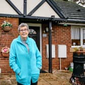 Lilian Lavery stands outside her bungalow in Meanwood. 