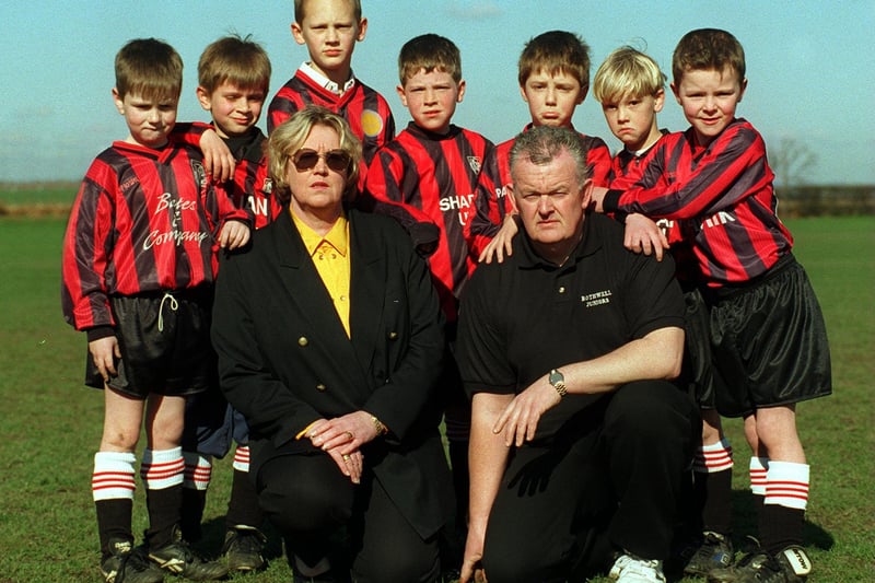 Elaine McKone treasurer of Rothwell Juniors and Dave Pearson, general manager, with some of their team in March 1997. Pictured, from left, are Sam Raw, Oliver Forrows, Jonathan Doughty, Joshua Ide, Jack Griffiths, Nathan Tinker and John Lunn.