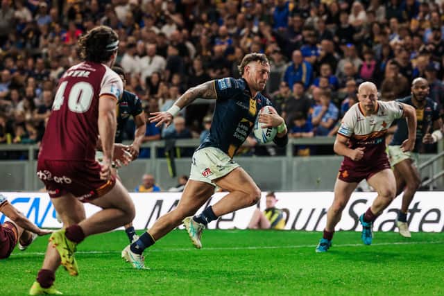 Chris Hankinson runs in to score for Leeds Rhinos against Huddersfield Giants. Picture by Alex Whitehead/SWpix.com.