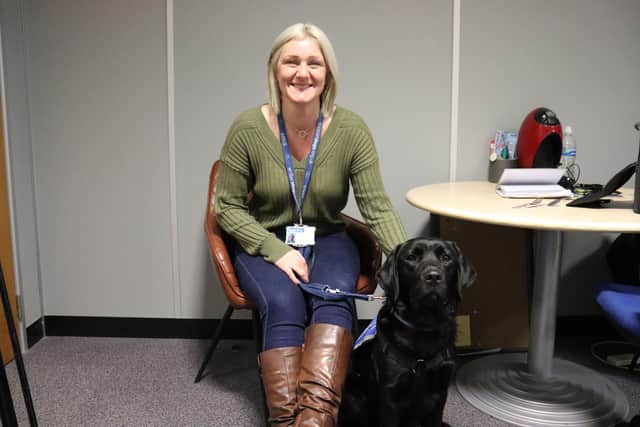 Katie Burns with trainee support dog Sascha