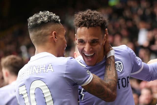 WATFORD, ENGLAND - APRIL 09: Rodrigo Moreno celebrates with Raphinha of Leeds United after scoring their team's second goal during the Premier League match between Watford and Leeds United at Vicarage Road on April 09, 2022 in Watford, England. (Photo by Alex Morton/Getty Images)