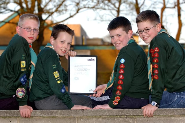 Members from Yeadon's 16th Airedale Cub Pack who had been awarded 'The Chief Scouts Silver Award' in April 2003. Pictured, from left, are Reece Kirby,  William Harrison, Thomas Spence  and Sebastian Phillips.