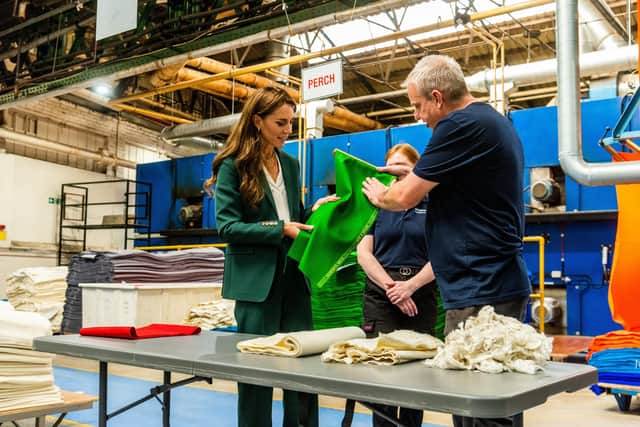 The Princess of Wales discussing the raising process used to produce snooker table cloths at AW Hainsworth's factory in Stanningley, in 2023