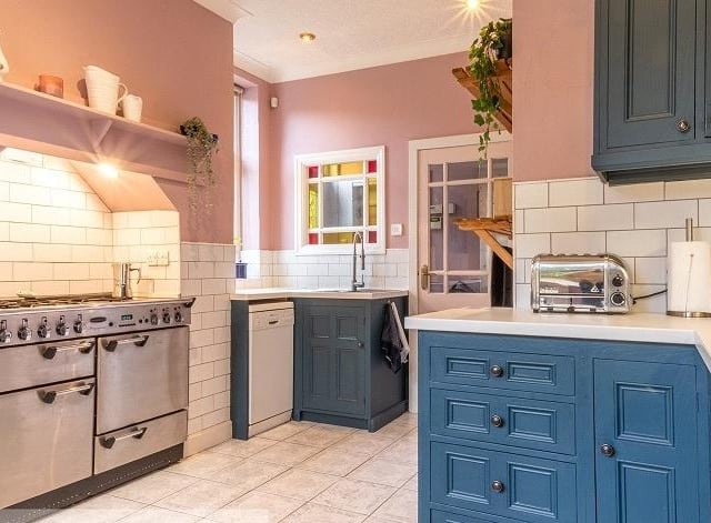 An alternative view of the stylish kitchen with its full range of fitted units.