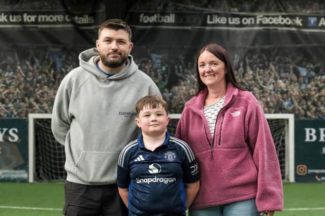 Louis with proud mum and dad, Ben and Lindsey