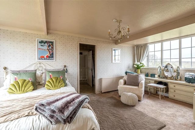 The generously proportioned master bedroom is serviced by an en-suite shower room.