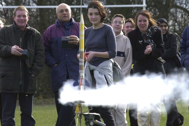 Sian Davis from Oakbank School, Keighley, launches a rocket as part of National Science week, at the playing fields on Woodhall Lane, Pudsey, on March 20, 2001.
