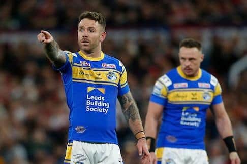 James Donaldson looks on as teammate Richie Myler makes a point during the Grand Final. Picture by Ed Sykes/SWpix.com.