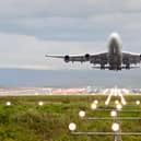 A plane taking off at Manchester Airport