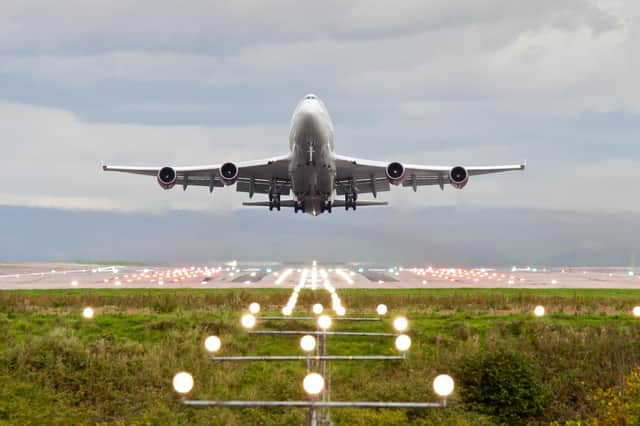 A plane taking off at Manchester Airport