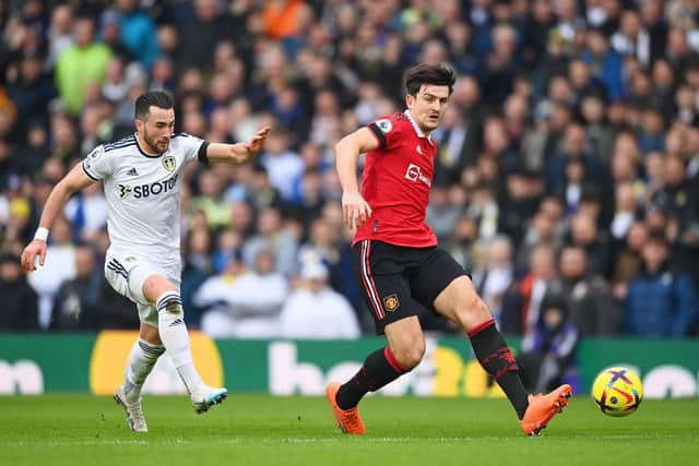 WHITES BRIEF: For Harry Maguire, right, and his Manchester United side as the Red Devils captain is closed down by Jack Harrison in Sunday's Premier League clash at Elland Road. Photo by Gareth Copley/Getty Images.