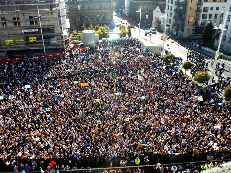 Fans turned out in force to give Rhinos a heroes' welcome in Millennium Square the day after the Grand Final.