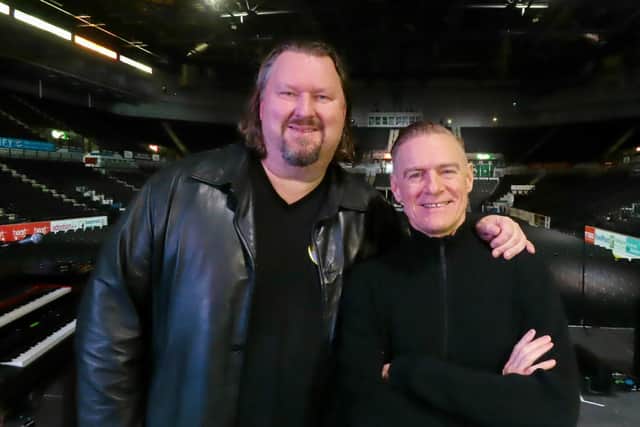 Eliot Kennedy with song-writing pal Bryan Adams