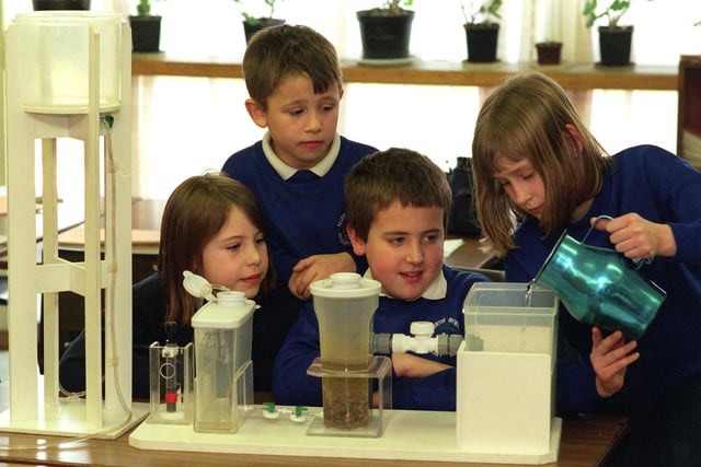 Pupils at Allerton Bywater Primary won an environment award in January 1999. Pictured, from left, are Emma Kent, Adam Fairhead, Christopher Longthorpe and Laura Smith working on seeing how water journeys from the reservoir  to the home.