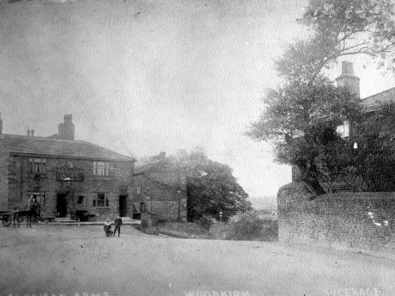 The original road bend showing the Cardigan Arms with the Woodkirk old vicarage on the right. Pictured in the 1920.