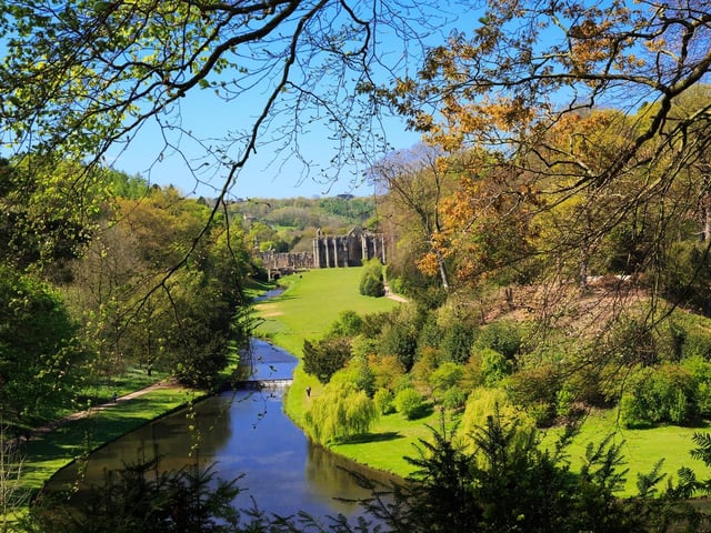 UNESCO World Heritage Site features the ancient atmospheric ruins of Fountains Abbey ruins and a gorgeous water garden with secret statues and glistening ponds.