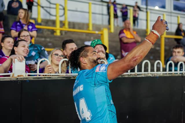 Ashton Golding celebrates Huddersfield Giants' win at Castleford Tigers last July.  Picture by Alex Whitehead/SWpix.com.