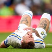 LEEDS, ENGLAND - AUGUST 06: Liam Cooper of Leeds United picks an injury after scoring his team's first goal during the Sky Bet Championship match between Leeds United and Cardiff City at Elland Road on August 06, 2023 in Leeds, England. (Photo by Alex Caparros/Getty Images)
