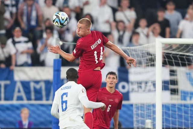 OLD AND NEW: Leeds United summer signing Glen Kamara looks on for Finland as departed Whites loanee Rasmus Kristensen clears for Denmark in Sunday evening's Euros qualifier in Helsinki. Photo by MADS CLAUS RASMUSSEN/Ritzau Scanpix/AFP via Getty Images.