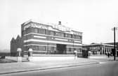 Smith's Potato Crisp factory, built on part of the site of the former York Road, Iron and Coal company. To the right no. 401 York Road is Leeds Modern Garage Ltd. Pictured in July 1931.