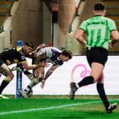 Tom Johnstone scores the first of his two tries for Wakefield Trinity in Friday's win at York Knights. Picture by Alex Whitehead/SWpix.com.