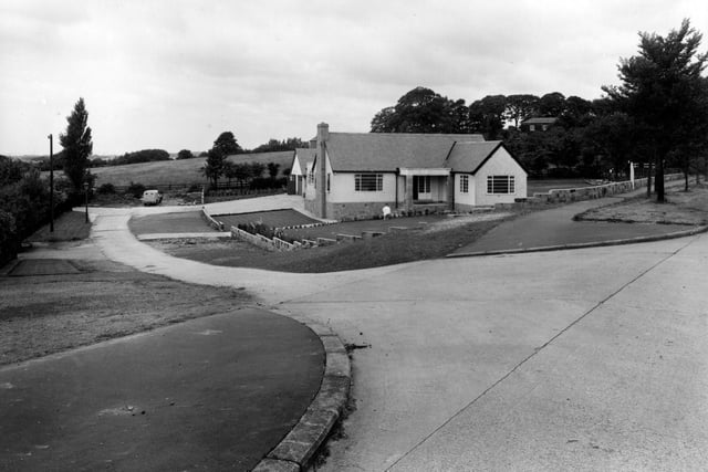 A view looking south west down The Fairway from Alwoodley Lane in July 1954.
