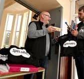 Tony Wing, VCHP Project Manager handing out care packages for people visiting the drop in session