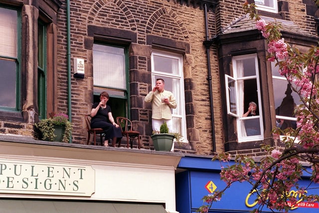 A grandstand view for these Ilkley residents as they watch the town's carnival pass by in May 1999.