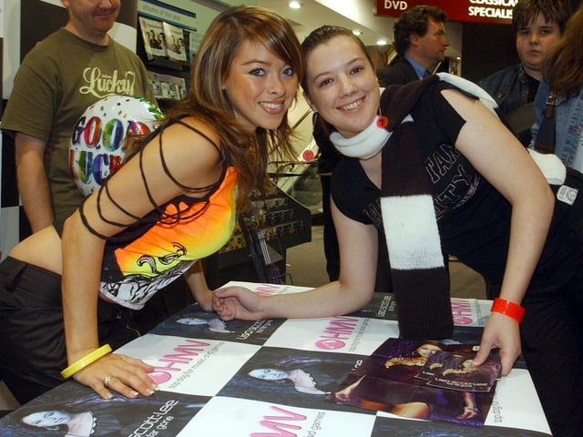 Steps star turned solo star Lisa Scott-Lee visited HMV in city centre in September 2003. She is pictured with fan, Ally Czech from Armley.