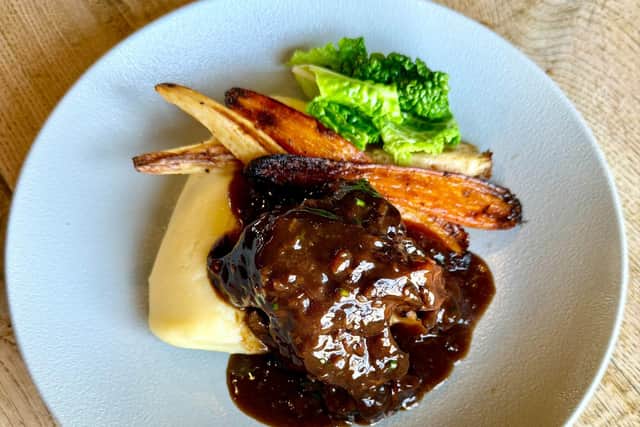 The Seafood Pub Company’s slow-cooked lamb with buttered mashed potato, roasted roots and red wine and thyme sauce.
