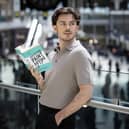 Trainline has launched a new series of limited-edition ‘decoy’ book covers in collaboration with Jack Edwards at London Waterloo Station, designed to allow travellers to conceal their reading material in public, as one in two admit stigma over being seen with 'spicy books'. Pic: Matt Alexander/PA Media Assignments