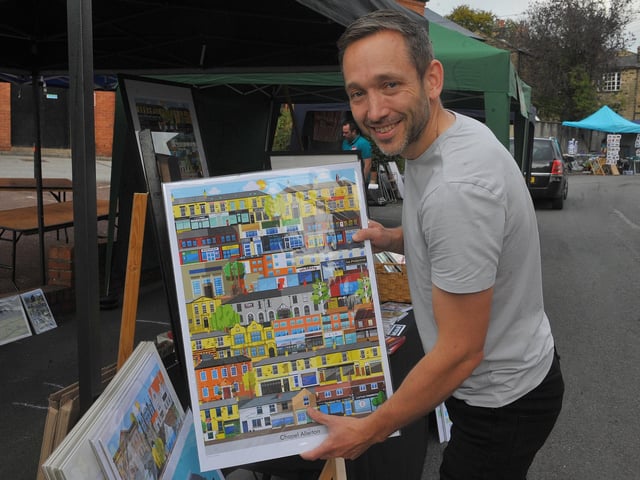 Local artist Richard Locket, a graphic artist, with his flat graphics picture of Chapel Allerton