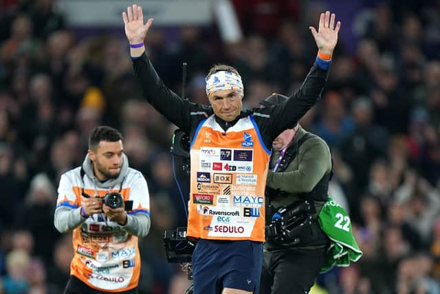 Kevin Sinfield applauds the crowd following the end of his Ultra 7 in 7 Challenge at Old Trafford during the Rugby League World Cup final.