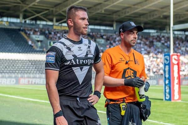 Jack Walker leaves the field after suffering an ankle injury in Hull's home loss to St Helens. Picture by Allan McKenzie/SWpix.com.
