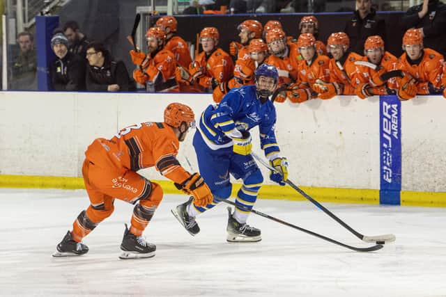 Leeds Knights Edgar Vengis looks for options as Steeldogs' David Phillips closes. (Picture: Tony Johnson)