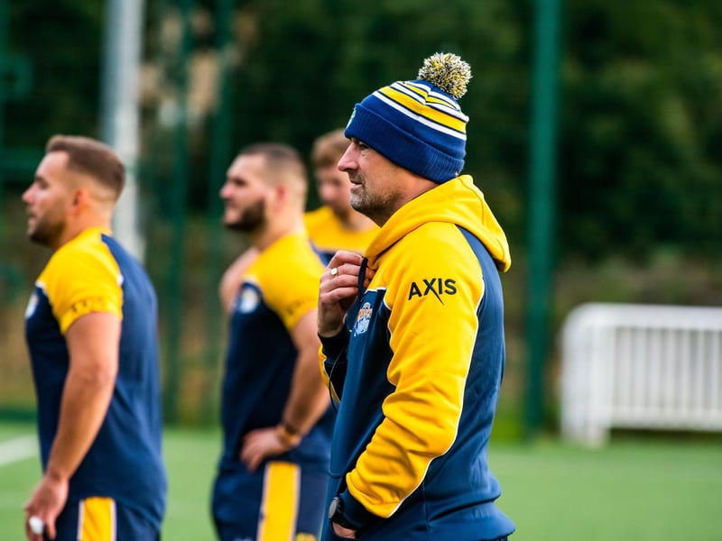 Rhinos' head of performance Richard Hunwicks supervises training.