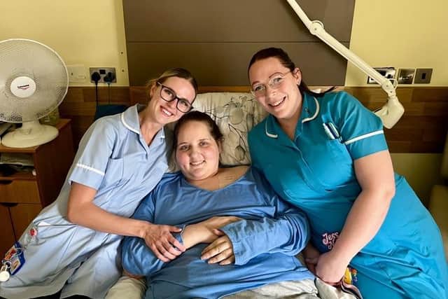 Poppy with hospice nurses.