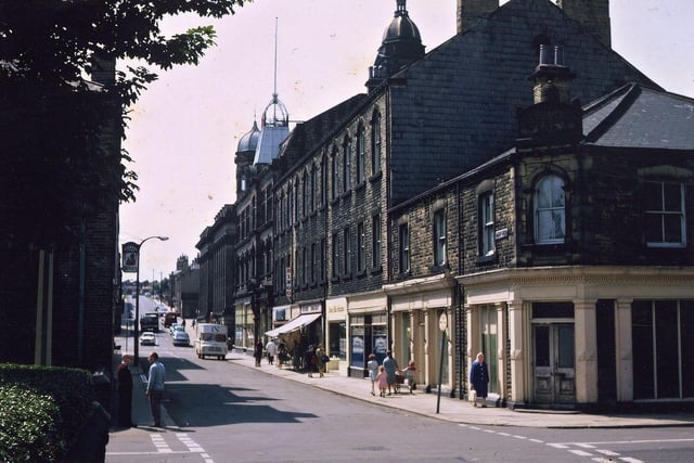 Albion Street from the junction with Commercial Street. The Co-operative shops on Queen Street are still in existence but those on Albion Street, especially those that date from 1869, are all in the process of changing hands and the Co-op Hall already has a bingo notice outside. Note that Albion Street is still continuous as far as Corporation Street.