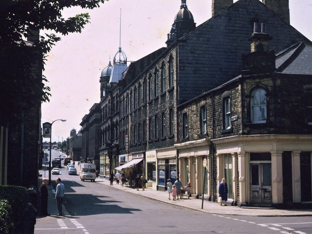 Albion Street from the junction with Commercial Street. The Co-operative shops on Queen Street are still in existence but those on Albion Street, especially those that date from 1869, are all in the process of changing hands and the Co-op Hall already has a bingo notice outside. Note that Albion Street is still continuous as far as Corporation Street.