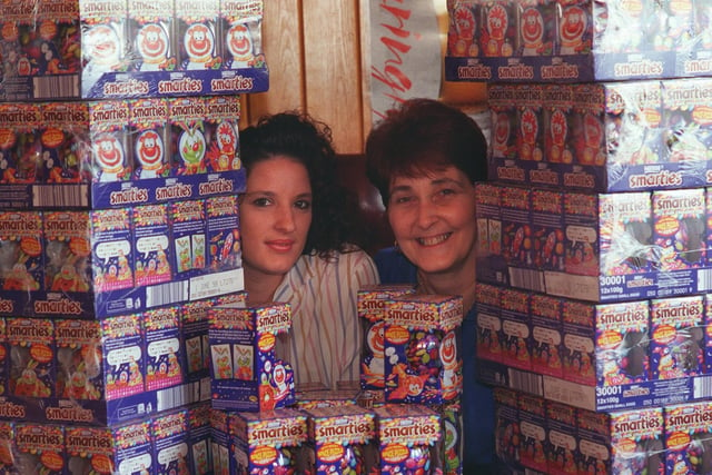 Lynda Rhodes, right, landlady of the Penda's Arms and barmaid Tracy Ponting are pictured with a stack of Easter eggs ready for distribution to children in hospital in April 1998.