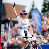 Tom Pidcock celebrates a solo win in the  Men Elite XCO round of the UCI Mountain Bike World Series in the Czech Republic.