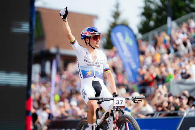 Tom Pidcock celebrates a solo win in the  Men Elite XCO round of the UCI Mountain Bike World Series in the Czech Republic.