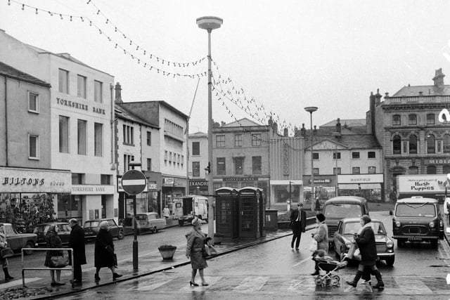Dewsbury Market Place and shops in January 1971.