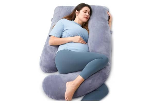 Get a better night's sleep with the Momcozy U Shaped Pillow.