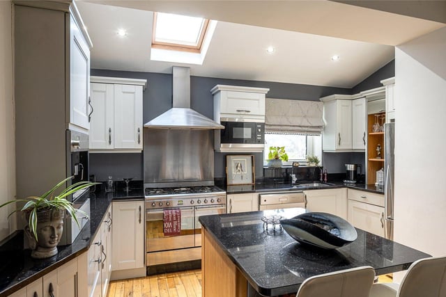 The impressive open plan dining kitchen plays host to several quality fitted appliances, along with granite worksurfaces and provides a central hub to this wonderful home that can be enjoyed by all.