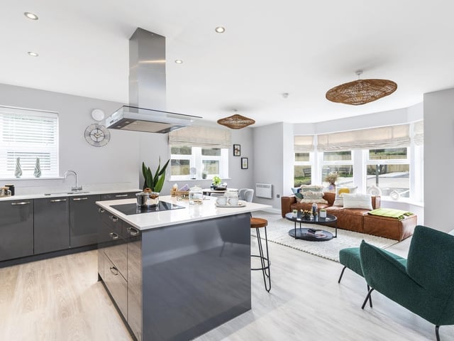 The open plan kitchen diner and living room in one of the apartments.