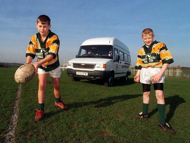 Hunslet Parkside Amateur RL captain Jamie Bradley (left) and vice-captain  Craig Hickinson are pictured with the club's new mini coach in February 1998.