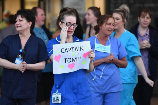 People across the country took part in a national applause on Wednesday 3 February to commemorate Captain Tom (Getty Images)