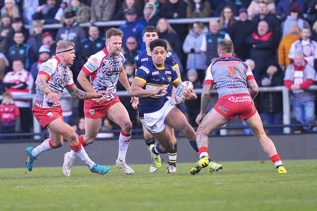 Derrell Olpherts, pictured in last Sunday's game at Leigh, could play centre, wing or full-back for Rhinos. Picture by Steve Riding.