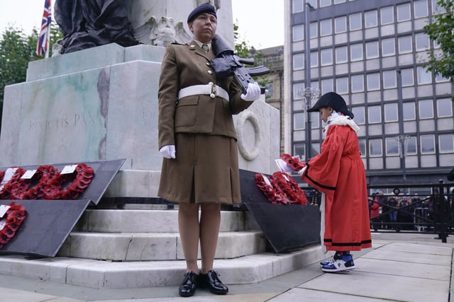 A wreath is laid at Leeds War Memorial during a Remembrance Sunday service in Leeds city centre. Photo credit: Danny Lawson/PA Wire
